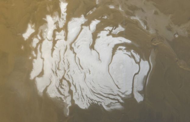Surface ice near the South Pole - liquid water underneath