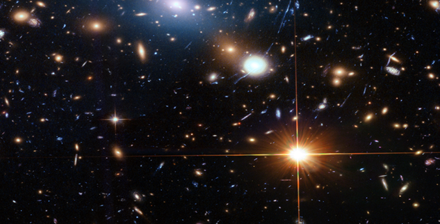 : The galaxy cluster MACS J0416.1-2403 also produces a gentle glow of intracluster light