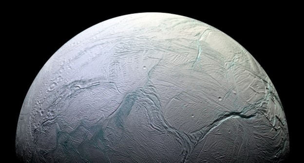 This chain of craters on Enceladus looks like a Saturnian snowman
